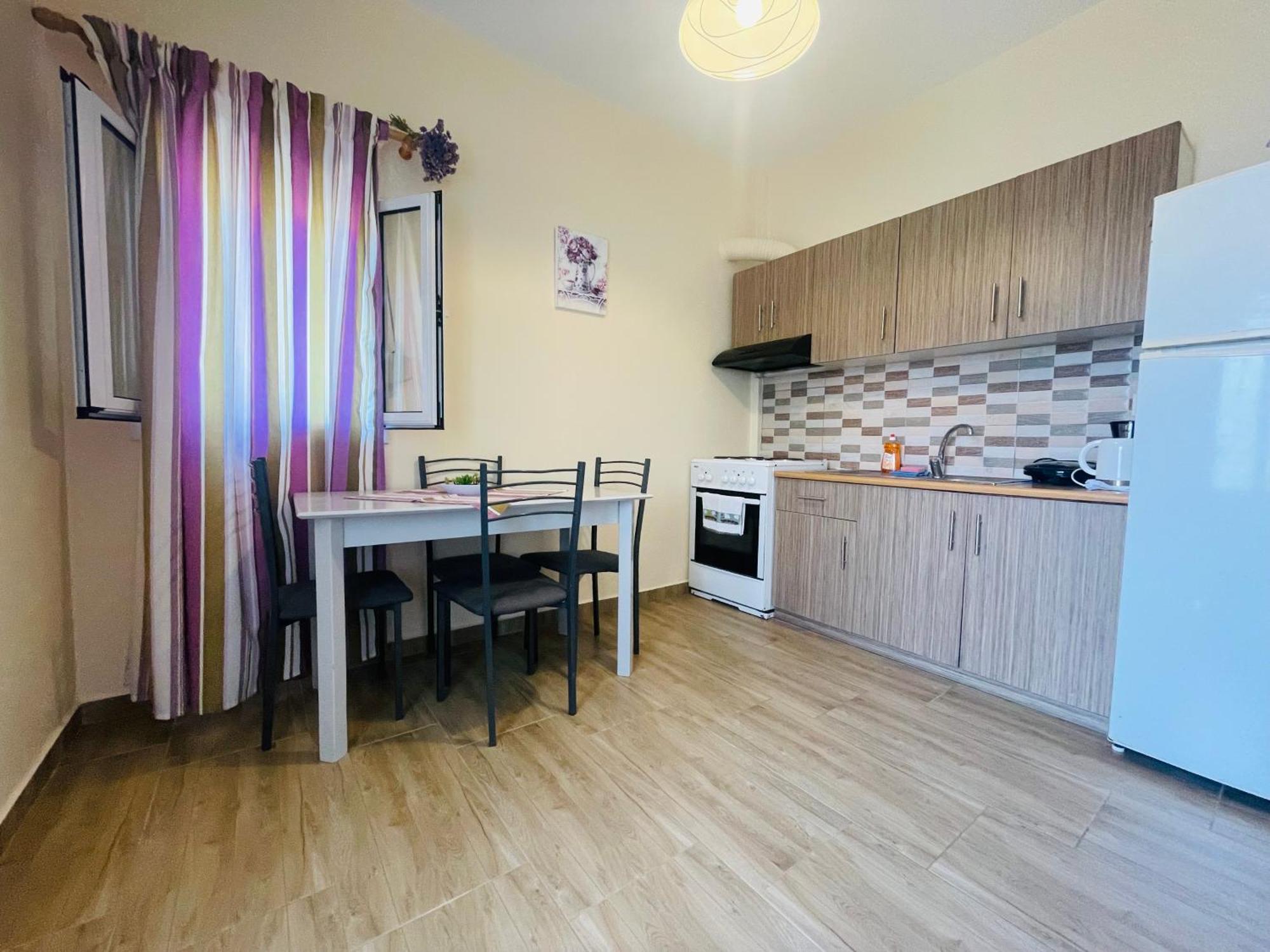 Fergani Apartments Moudhros Экстерьер фото