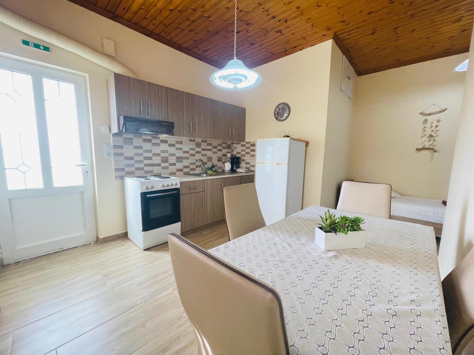 Fergani Apartments Moudhros Экстерьер фото